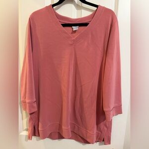 Chico’s zenergy long line 3/4 sleeve top in a dark peach color.